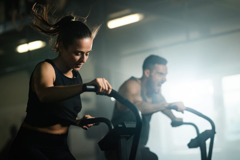 Nutrition tips for endurance, woman and man working out energetically.